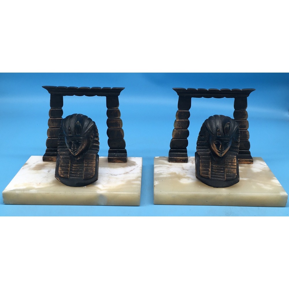 Brass Egyptian head Bookends On Blond Marble Base
